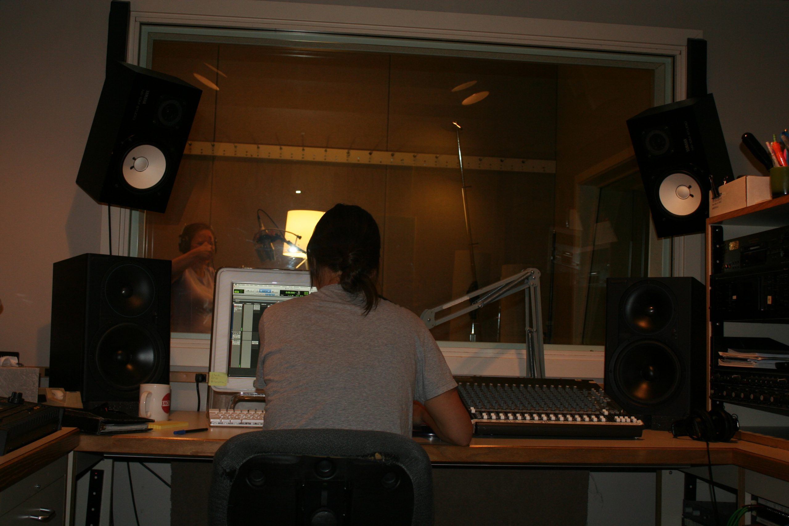Laurie giving thumbs up at the studio recording